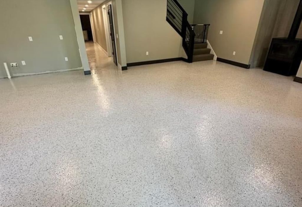 Finished basement with a light speckled flake floor coating
